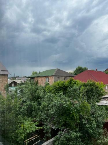 a group of houses and trees in a city at Meiman House close to Asia Mall in Bishkek