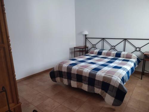 En eller flere senge i et værelse på El Domingo en el Valle