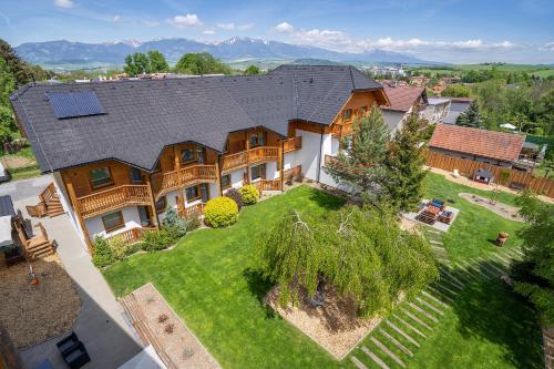 an overhead view of a home with a roof at Penzion Maria in Liptovský Mikuláš