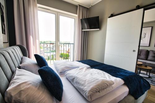 Posteľ alebo postele v izbe v ubytovaní Apartament Timi Zator by Housine