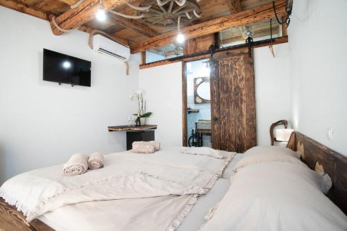 Postel nebo postele na pokoji v ubytování Casa Coronica