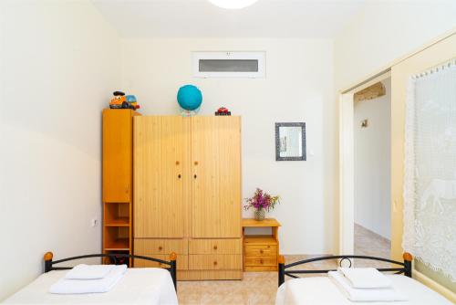Ένα ή περισσότερα κρεβάτια σε δωμάτιο στο Rosa 's house