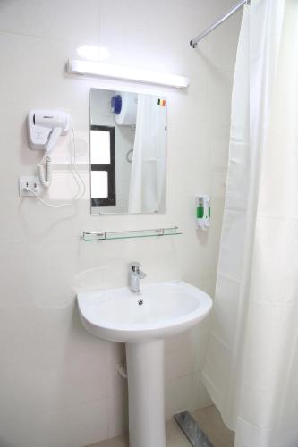 Ванная комната в Dream Square Hotel
