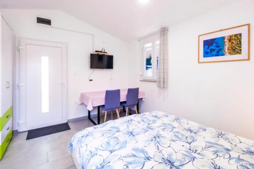 Katil atau katil-katil dalam bilik di Apartment & Studio Gortan Ferienwohnung Marcana, Pula, Istria Istrien