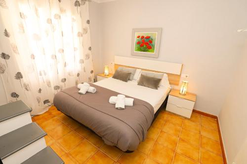 A bed or beds in a room at DIFFERENTFLATS Florida