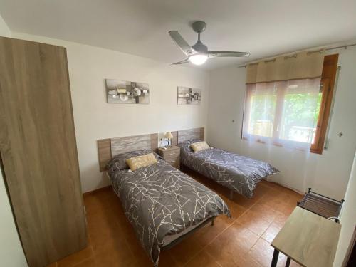 Postel nebo postele na pokoji v ubytování Casa La Gavina