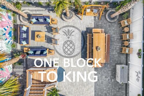 a one block to king sign on the side of a building at Hidden Outdoor Oasis - 1 BLOCK TO KING in Charleston