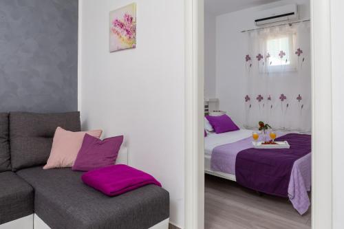 Ένα ή περισσότερα κρεβάτια σε δωμάτιο στο Apartments Babic