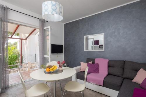 Μια τηλεόραση ή/και κέντρο ψυχαγωγίας στο Apartments Babic