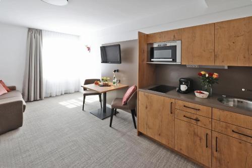 Kuchyň nebo kuchyňský kout v ubytování Hotel Gasthof Jägerstüble