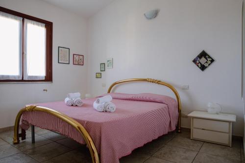 Postel nebo postele na pokoji v ubytování APP.TO VIA MARE - BUDONI SWEET HOME