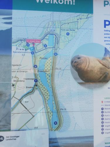 a map with a seal on top of it at Ediths Haus in Rhauderfehn