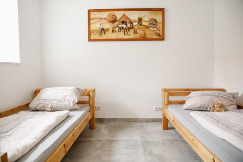 Postel nebo postele na pokoji v ubytování Reit- und Bauernhof Klaucke