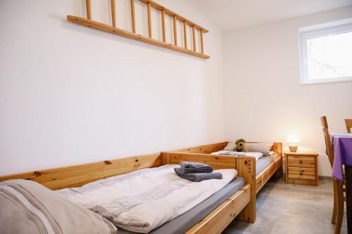 Postel nebo postele na pokoji v ubytování Reit- und Bauernhof Klaucke