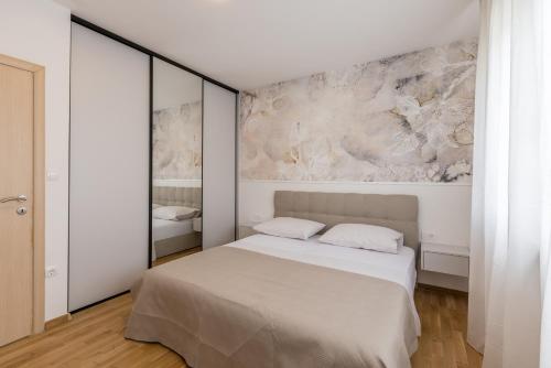 Posteľ alebo postele v izbe v ubytovaní Apartment Dolce D