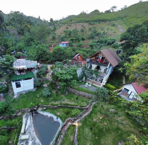 an aerial view of a house on a hill at Dolape Villa in Ella