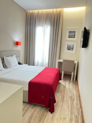 Postel nebo postele na pokoji v ubytování Seculo Soft