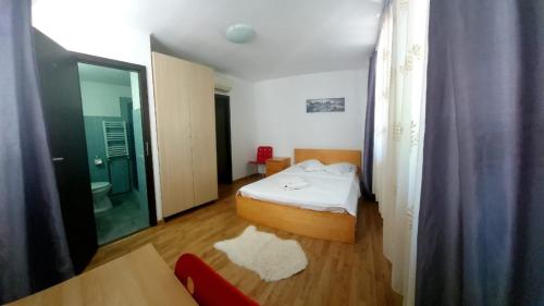 Postel nebo postele na pokoji v ubytování Happy Accomodation
