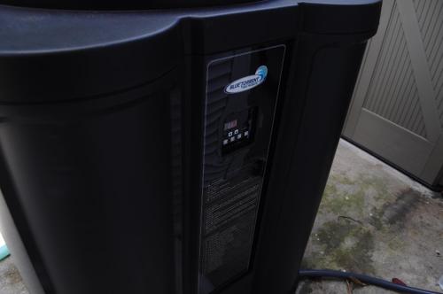 a black computer tower sitting next to a table at Bike to the beach, walk to restaurants, heated pool, secluded in Fort Lauderdale