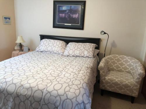 A bed or beds in a room at 1 or 2 bedrooms with bath in our shared home at Indian Peaks Golf Course