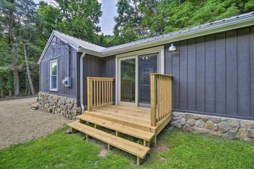 a large wooden deck on the side of a house at Updated Bristol Retreat about 2 Miles to Downtown! in Bristol