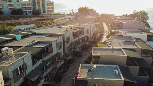 an aerial view of a city with buildings at Villa Amos at Aquamarine Residence in Vlorë