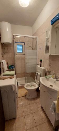 Ett badrum på Apartman 3D