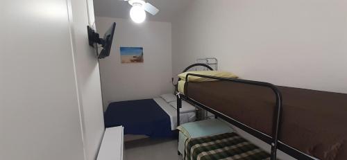 Postel nebo postele na pokoji v ubytování Mignon Locazioni brevi ad Avola - Sicilia - mare