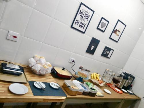 a table with food on it in a room at HLN Hotel - Expo - Anhembi in Sao Paulo