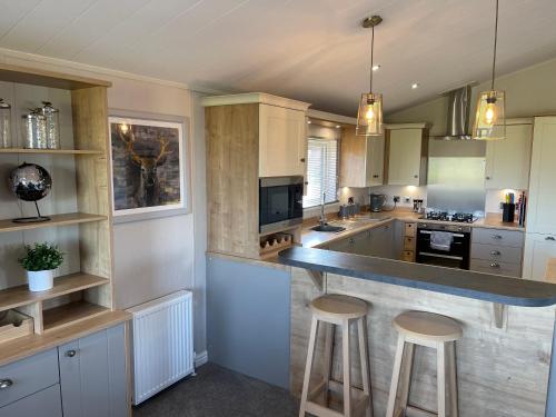 Η κουζίνα ή μικρή κουζίνα στο Yorkshire view lodge