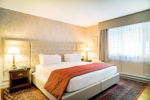 Ένα ή περισσότερα κρεβάτια σε δωμάτιο στο Ripplecove Hotel & Spa