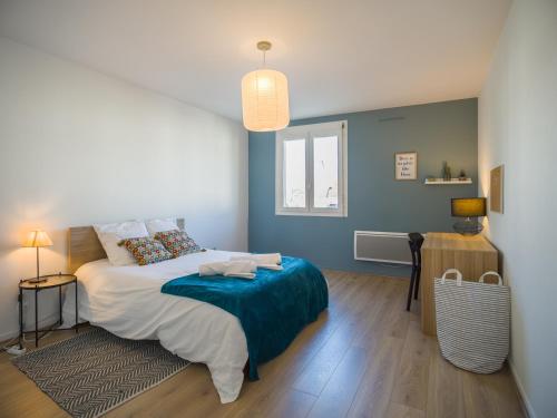En eller flere senge i et værelse på L'Anatole - Smart Appart - Centre-Ville Troyes