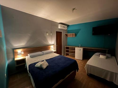Кровать или кровати в номере Pousada Paradise Vista do Atlantico
