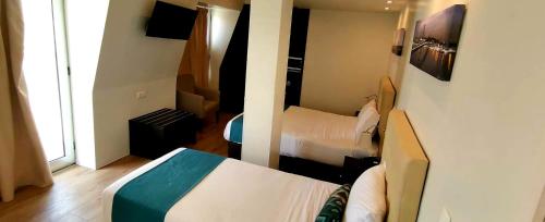 Lisbon City Hotel by City Hotelsにあるベッド