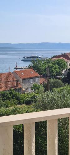 a view of the ocean from a balcony at APARTMAN BRIGIT - CENTAR in Bol