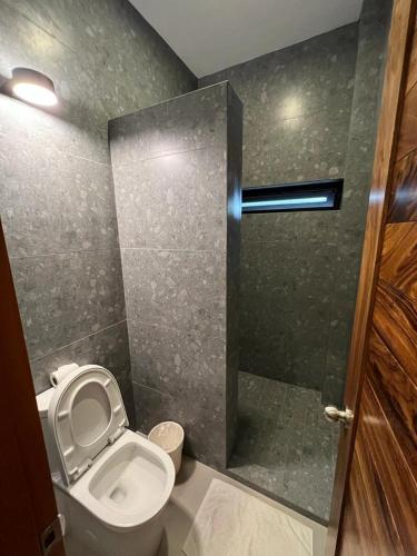 Ein Badezimmer in der Unterkunft Hotel Palmeras