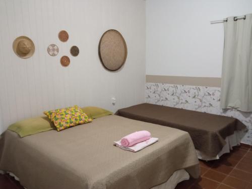 Katil atau katil-katil dalam bilik di Hospedaria Vila Else