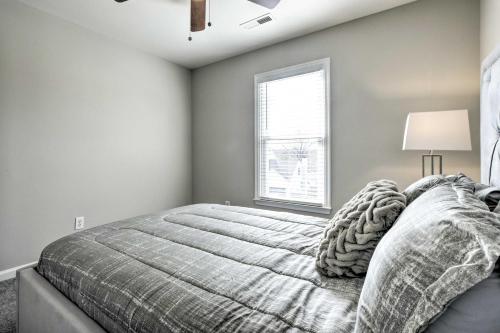 a bedroom with a large bed and a window at Gorgeous Graham Home with Private Outdoor Pool! in Graham
