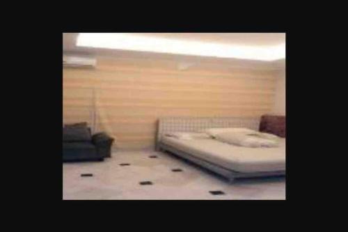 Postel nebo postele na pokoji v ubytování Nice house with modern furniture at Bandung