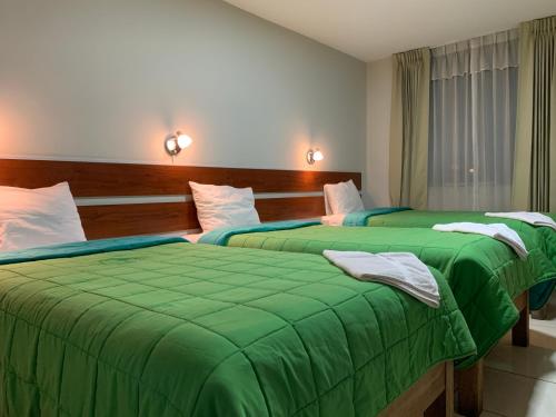 Katil atau katil-katil dalam bilik di Hotel Herusalen