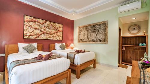 Letto o letti in una camera di The Village Guest House