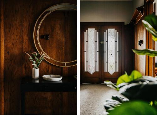 dos fotos de una habitación con una puerta y un espejo en Gilbert by Whiskey June, en Maryborough