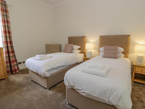 Кровать или кровати в номере North Firbank - Culzean Castle