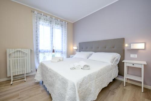 מיטה או מיטות בחדר ב-Casa Francesca