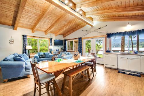 a kitchen and living room with a wooden table and chairs at Silver King in Bellingham