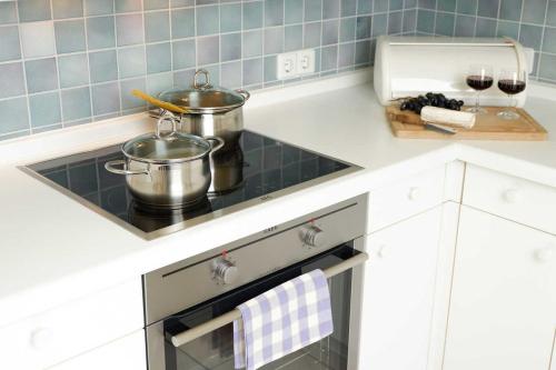 Nhà bếp/bếp nhỏ tại Ferienwohnung Ostfriesenglück