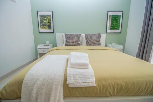 Ένα ή περισσότερα κρεβάτια σε δωμάτιο στο As melhores experiências de conforto e lazer