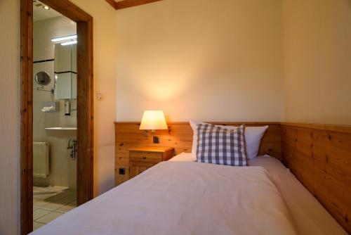 Postel nebo postele na pokoji v ubytování Hotel Zum Harzer