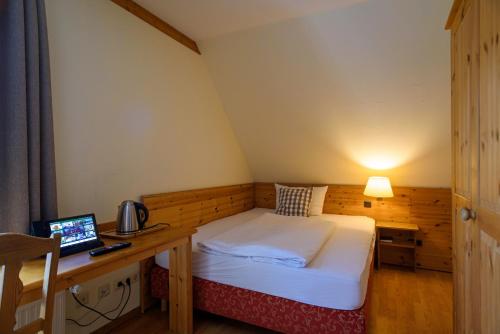 Postel nebo postele na pokoji v ubytování Hotel Zum Harzer