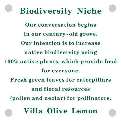 a sign that reads biodiversity niche our conservation begins in our country old groynes our at Olive Lemon Biophilic House & Lush Forest Garden in Vamos